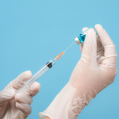 Hands of doctor with syringe and medicine, Nurse or doctor