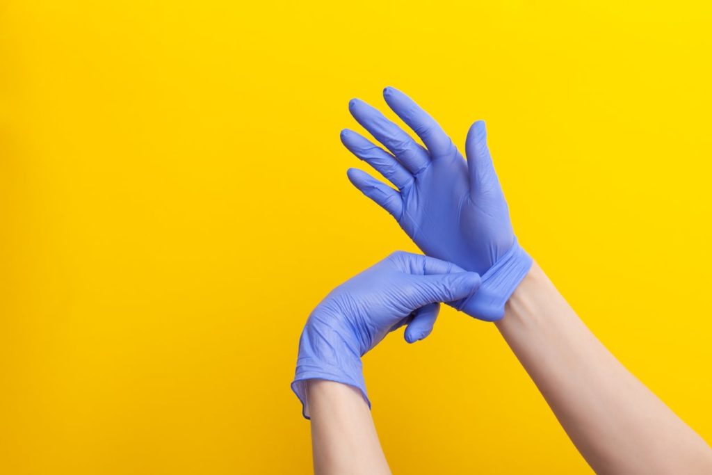 purple medical gloves